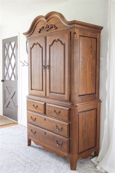 The trick to making wood look realistically weathered is to not overdo it. Armoire Makeover + How to Antique Furniture - Love Grows Wild