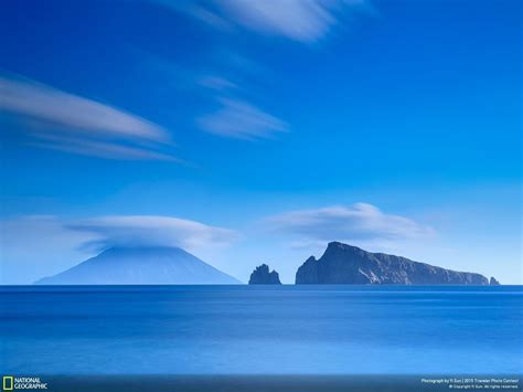 National Geographic Mountain Near Sea Sky Clouds Landscape Wildlife