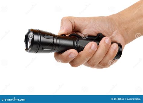 Hand Holding A Black Flashlight Stock Photos Image 34445563