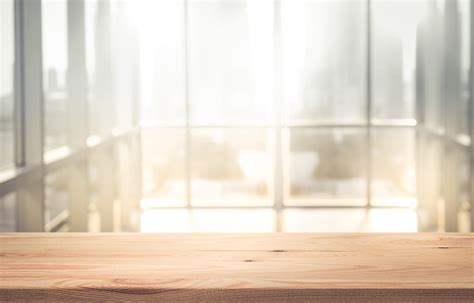Empty Wood Table Top With Blur Sunlight In Window Building Stock Photo