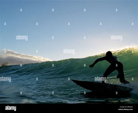 A Surfer Carving A Wave At Manly Beach Stock Photo Alamy