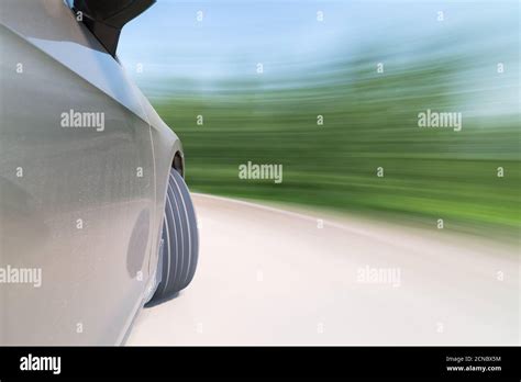 Car Driving Turn Motion Blur Stock Photo Alamy