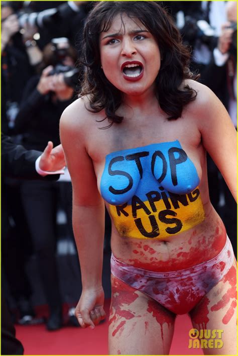 Topless Protester Storms The Red Carpet At Cannes 2022 Premiere See