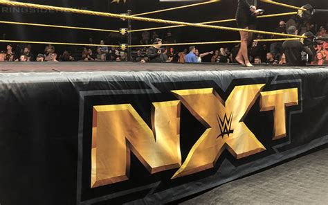 Wwe Nxt Superstar Rhyno Looks Across Ring At Wrestler Baron Corbin