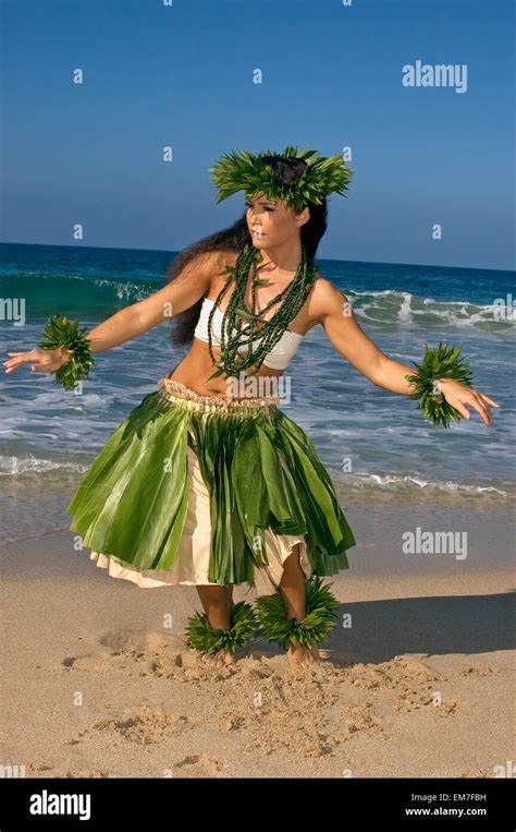 Hula Dancer In Ti Leaf Skirt Haku Lei In A Dancing Pose On The Beach