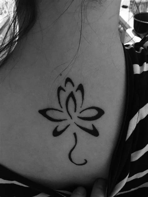 Pretty Lotus Flower Tattoo On Back Of Neck Back Tattoo Flower Tattoo