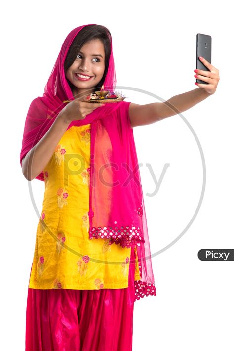 Image Of Beautiful Indian Girl Holding Pooja Thali Or Pooja Plate In