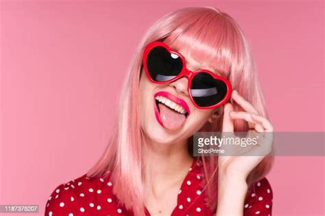 Woman With Heart Glasses Photos And Premium High Res Pictures Getty