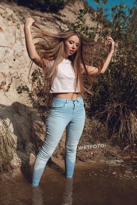 Long Haired Girl Makes Her Jeans Completely Wet At The Lake Wetfoto Com
