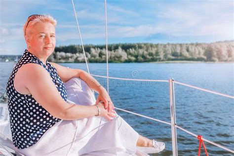 Older Woman Enjoying A Yacht Trip Horizontal Photo Stock Photo Image