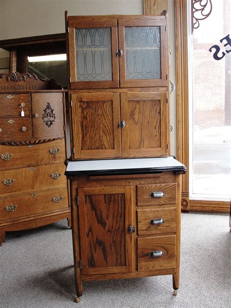 Elegant kitchen backsplash glass tiles. vintage oak hoosier style kitchen cabinet with etched ...