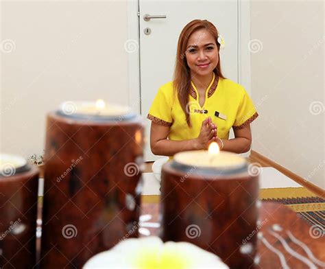 cute asian girl preparing herself for traditional thai massage body care concept massage