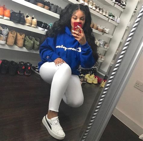 Instagram Baddie In Puma Sneakers White Jeans And A Blue
