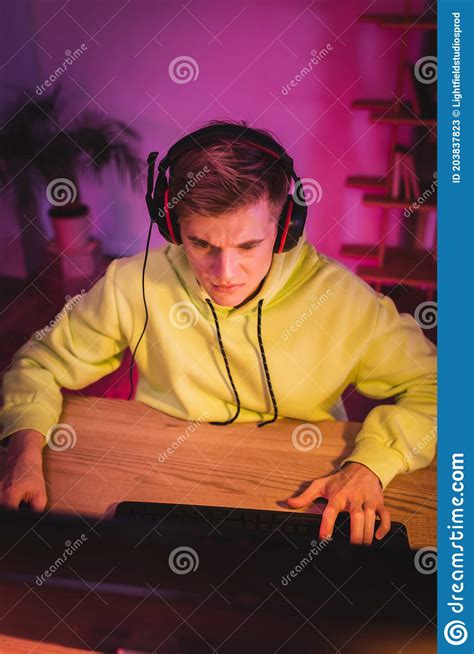 Concentrated Young Gamer In Headset Play Stock Image Image Of Online