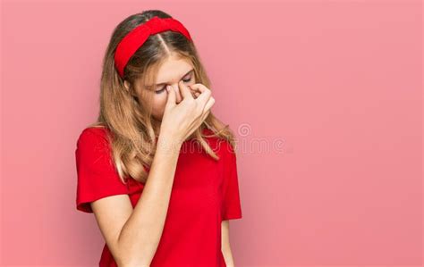 Beautiful Young Caucasian Girl Wearing Casual Red T Shirt Tired Rubbing Nose And Eyes Feeling