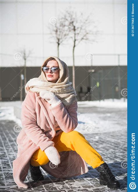 Beautiful And Stylish Russian Girl Model In Winter On The Street Of