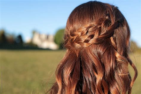 Brunette Teenage Girl With Her Hair In A Braided Crown By Stocksy