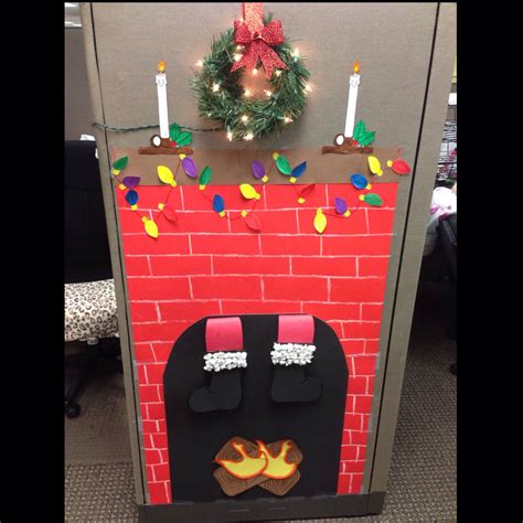 Instead of stuffing all the birthday and christmas cards you received in a drawer somewhere, try hanging them along the wall of your cubicle on clothespin line. Christmas Cubical decor :)) | Office christmas decorations