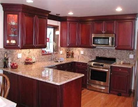 The dark tones of blue pearl granite on countertops or a backsplash strike a strong contrast against pure white kitchen cabinets, while a softer cream color balances the gray tones in the natural stone. Pin on Kitchen