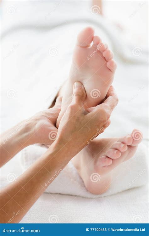 Cropped Image Of Woman Receiving Foot Massage Stock Image Image Of Handling Massage 77700433