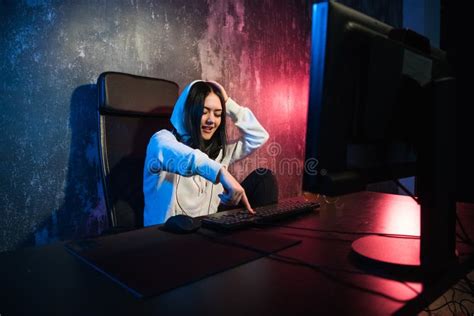 Excited Female Gamer Girl Woman Pressing A Button On A Keyboard Running