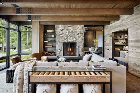 A Living Room Filled With Furniture And A Fire Place In The Middle Of