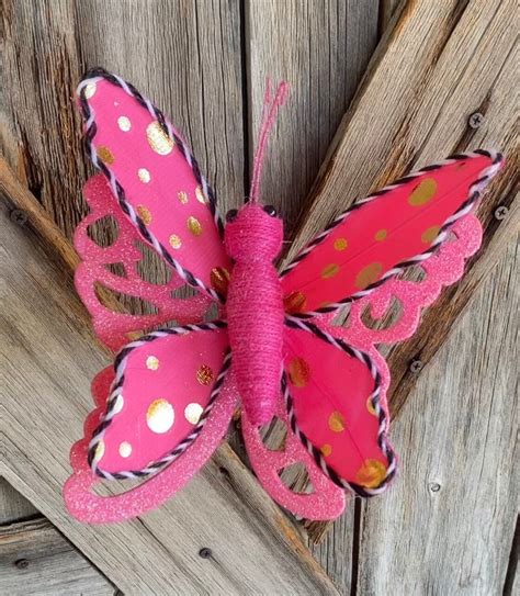 pink gold polkadot butterfly pick