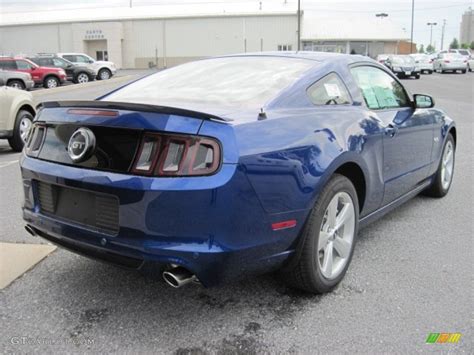 The new 2013 mustang gt, which ford made available in spring 2012, brings a crisper silhouette and a number of overall refinements. 2013 Deep Impact Blue Metallic Ford Mustang GT Coupe ...