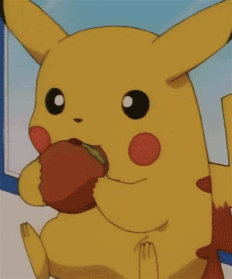 A Pikachu Eating An Apple In Front Of A Window