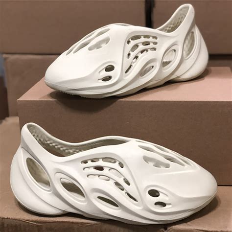 While the swirls of color surrounded the oval airflow holes. Yeezy Foam Runner Beige,Sneakers