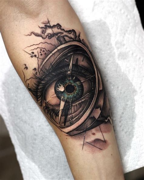 Eyre Inside The Compass Eyeball Tattoo Elbow Tattoos Tattoos For Guys