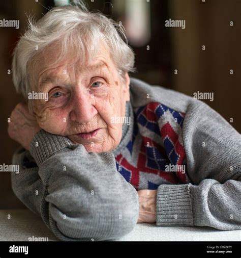 Portrait Of A Old Woman Close Up In Her Home Stock Photo Alamy