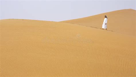 Arab Man Walking In A Desert Stock Image Image Of Camel Festival
