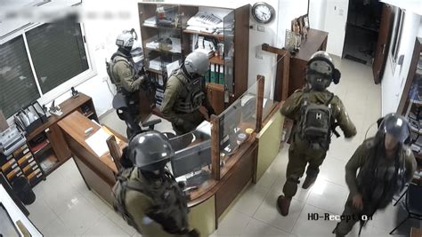 cctv footage shows israeli soldiers using violence and socializing during raid of al haq s