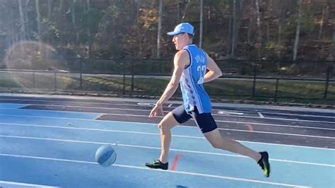 Track Coach Breaks Record For Fastest Mile While Dribbling Basketball