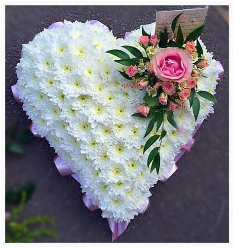 Maybe you would like to learn more about one of these? Massed Heart - Funeral Flowers Wirral