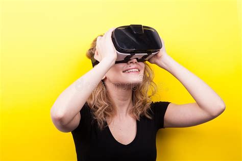 Smilnig Woman With A Vr Headset On Enjoying Virtual Reality Experience