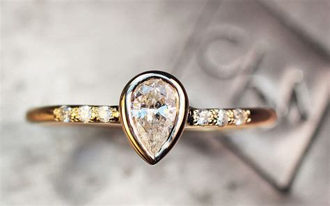 Pear Solitaire Diamond Ring In Yellow Gold Chinchar Maloney White
