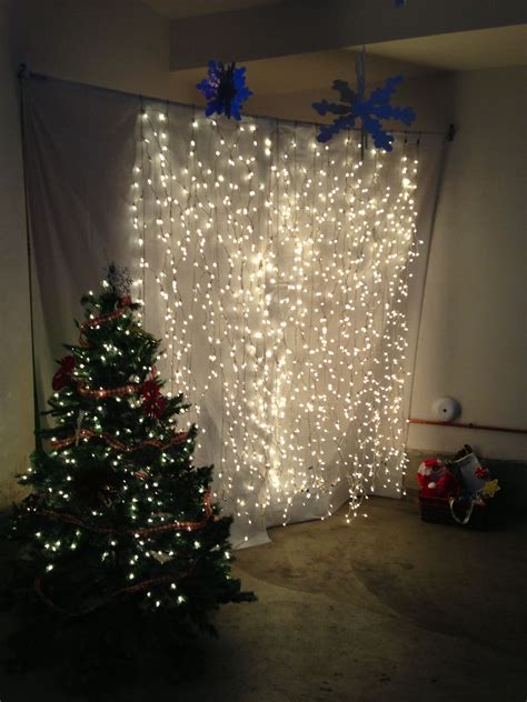 Christmas Lights Hanging Against A Back Drop As A Photo Booth Photo