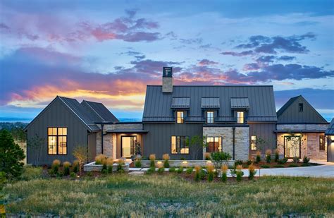 Contemporary Farmhouse With Dark Siding And Stone Exterior In 2021