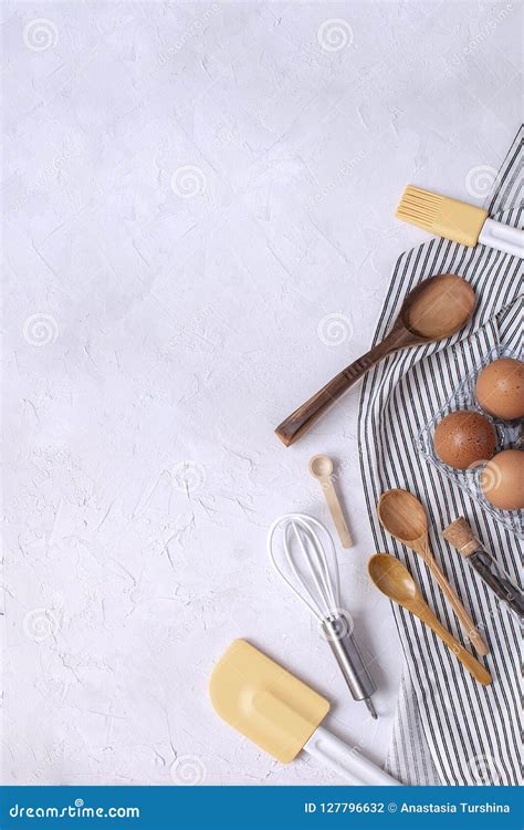 Kitchen Utensils And Ingredients For Baking Whisk Wooden Spoons