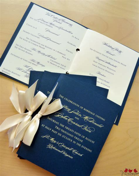 A Navy Ceremony Program Booklet With Textured Paper Ribbons And Foil