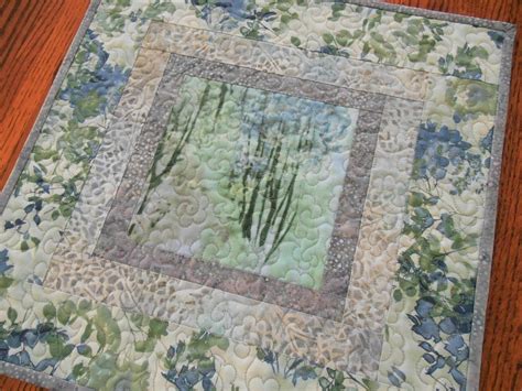 Square Table Topper In Soft Blues And Greens Quilted Table