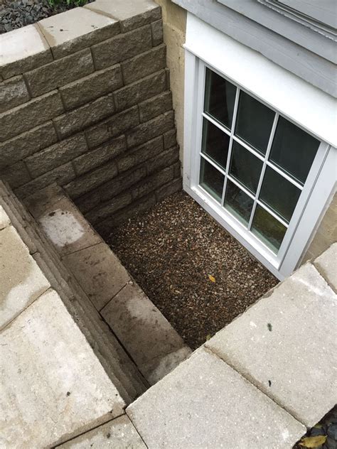 Marvin Divided Lites Single Egress Window In Block Well With Step At