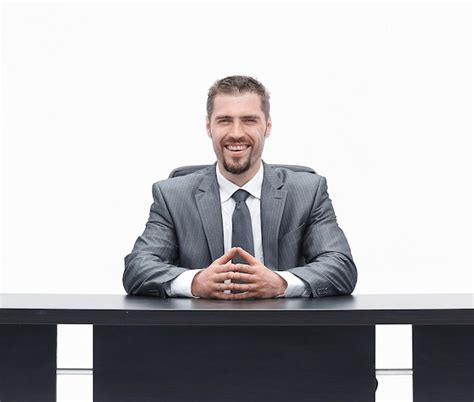 Premium Photo Closeupconfident Businessman Sitting Behind A Desk