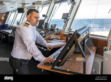 Ships Crew On Bridge Sailing Passenger Ship Ocean Adventurer Carries
