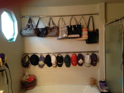 Purse rack stands are commonly used in retail stores to display handbags. Organized purses and hats! | Purse organization ...