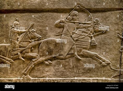 Panel de escultura relieve asirio Ashurnasirpal león caza Palacio de