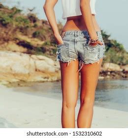 Woman Undressing On Beach Stock Photo Shutterstock