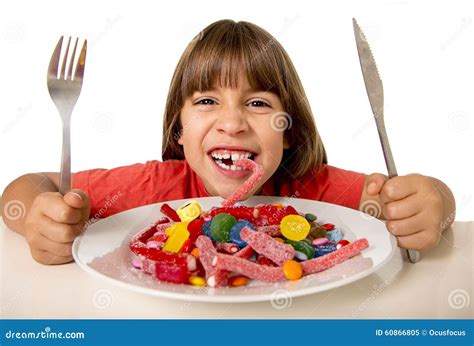 Child Eating Candy Like Crazy In Sugar Abuse And Unhealthy Sweet